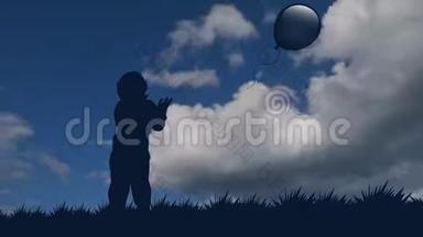 小男孩让<strong>气球</strong>飞向天空。 一个男孩在<strong>气球</strong>的背景下固定的<strong>剪影</strong>